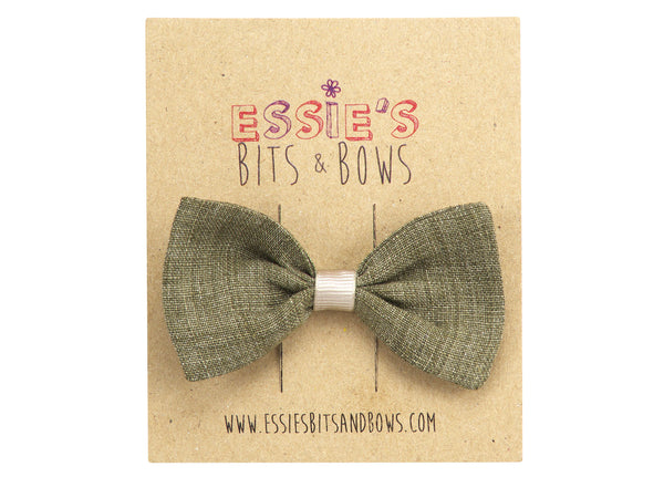 Khaki linen Anna hair bow in khaki on a display card