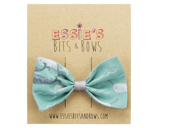 Narwhal Bella bow on a display card