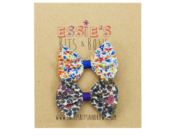 Liberty print Emelia's flowers and Eve Royal blue baby bows on display board