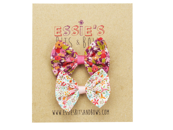 Liberty Betsy J and Eve pink baby bows on a display card